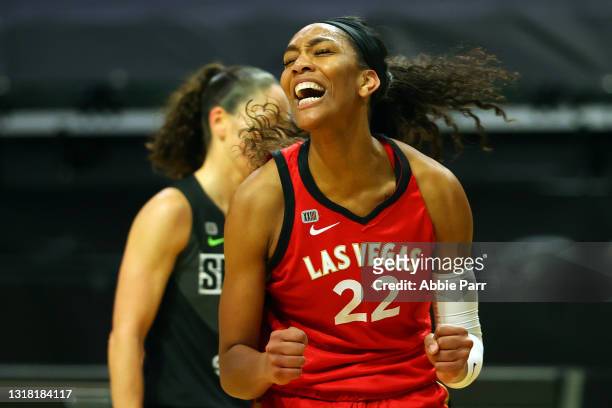 Ja Wilson of the Las Vegas Aces celebrates after making a basket while being fouled during the first quarter against the Seattle Storm at Angel of...