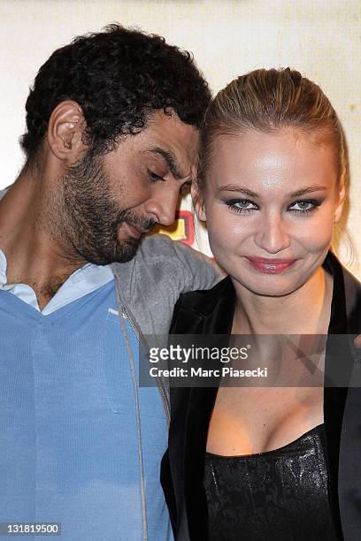 Ramzy Bedia and Anca Radici attend the 'Halal Police d'etat' premiere at UGC Cine Cite Bercy on February 15, 2011 in Paris, France.