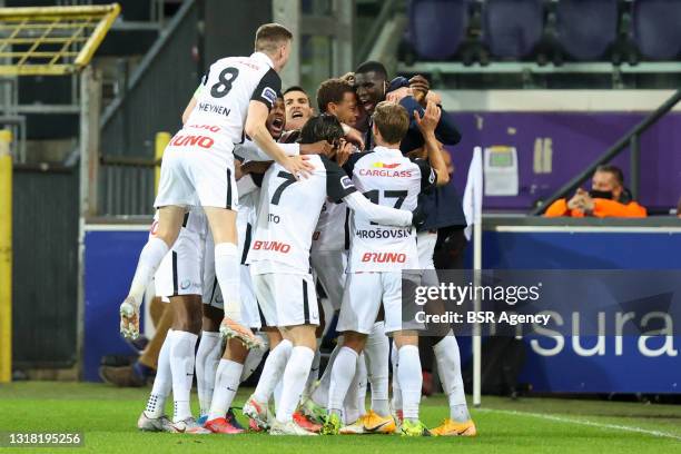 Cyriel Dessers of KRC Genk celebrates after scoring KRC Genk's second goal with Daniel Munoz of KRC Genk, Patrik Hrosovsky of KRC Genk, Luca Oyen of...