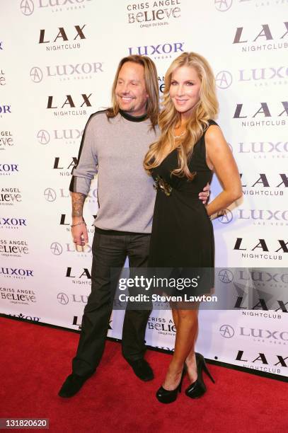 Singer Vince Neil and entertainment reporter Alicia Jacobs arrive for Criss Angel's birthday and 1000th 'Criss Angel BeLIEve' show at LAX Nightclub...