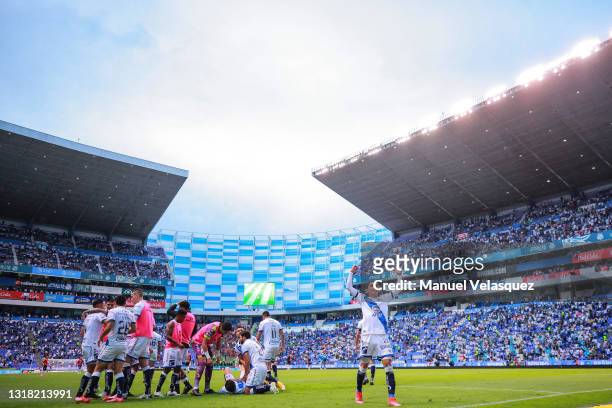 Players of Puebla celebrate their first goal during the quarterfinals second leg match between Puebla and Atlas as part of the Torneo Guard1anes 2021...