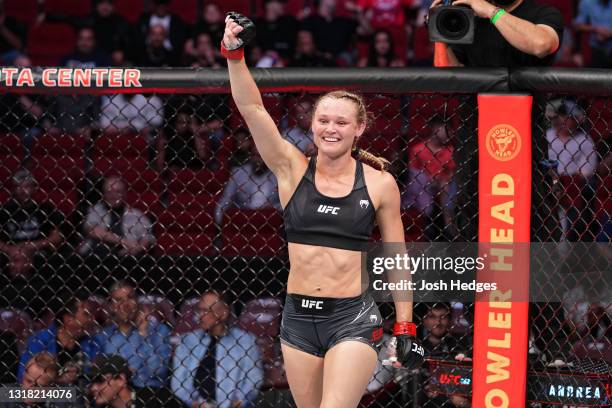 Andrea Lee reacts after defeating Antonina Shevchenko of Kyrgyzstan in their women's flyweight bout during the UFC 262 event at Toyota Center on May...