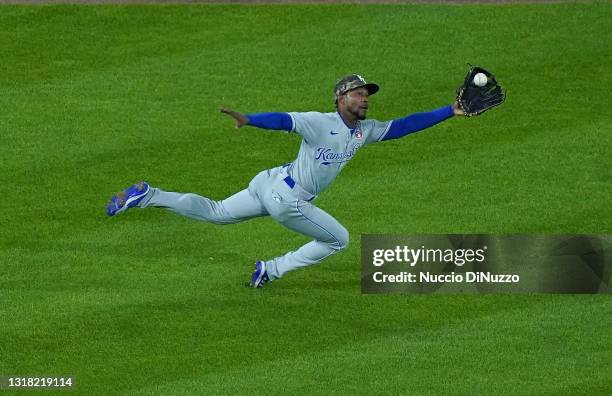 Jarrod Dyson of the Kansas City Royals makes a diving catch on the fly out by Andrew Vaughn of the Chicago White Sox during the seventh inning of a...