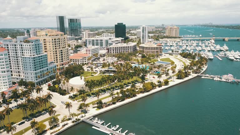 https://media.gettyimages.com/id/1318223090/video/aerial-footage-of-downtown-west-palm-beach-florida-inlet-waterfront-skyline-in-may-of-2021.jpg?b=1&s=640x640&k=20&c=fJw8qzd7hDhOB4H0tHP8SOiqS8vye0f4WymfENonqGw=