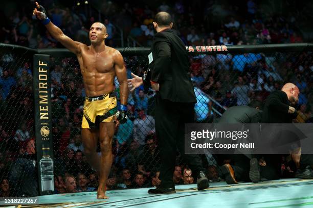 Edson Barboza of Brazil reacts after defeating Shane Burgos in their featherweight bout during the UFC 262 event at Toyota Center on May 15, 2021 in...