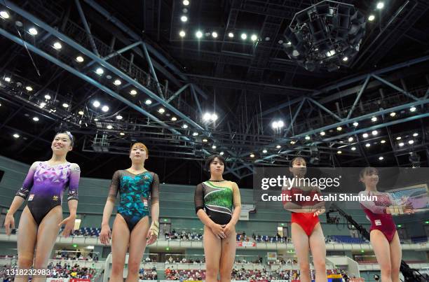 Hitomi Hatakeda, Yuna Hiraiwa, Mai Murakami, Aiko Sugihara and Asuka Teramoto are seen before competing on the Floor of Women's All Around on day one...