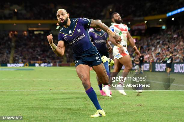 Josh Addo-Carr of the Storm celebrates after scoring a try during the round 10 NRL match between the Melbourne Storm and the St George Illawarra...