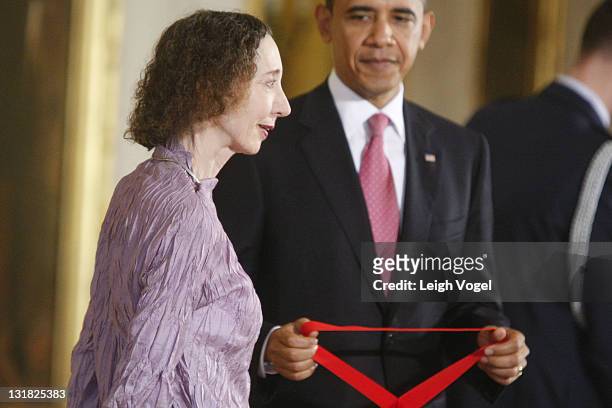 Joyce Carol Oates and Barack Obama attend the 2010 National Medal of Arts and National Humanities Medal at White House on March 2, 2011 in...