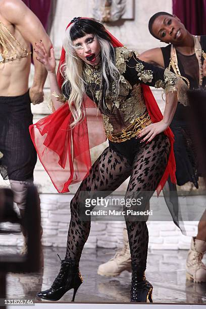 Lady Gaga performs her new song 'Judas' during the 'Le Grand Journal' tv show at Martinez Beach Pier on May 11, 2011 in Cannes, France.