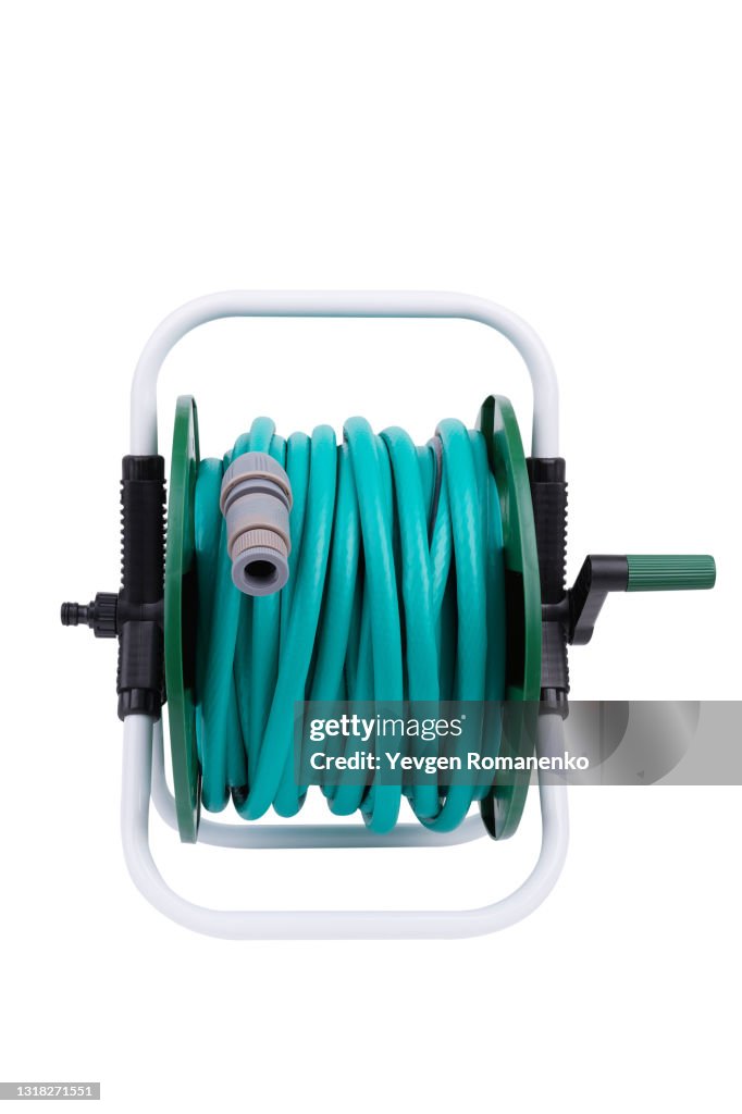 Garden Watering hose on a reel isolated on white background