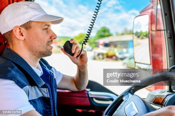 professional truck driver cb talking - cbs stock pictures, royalty-free photos & images