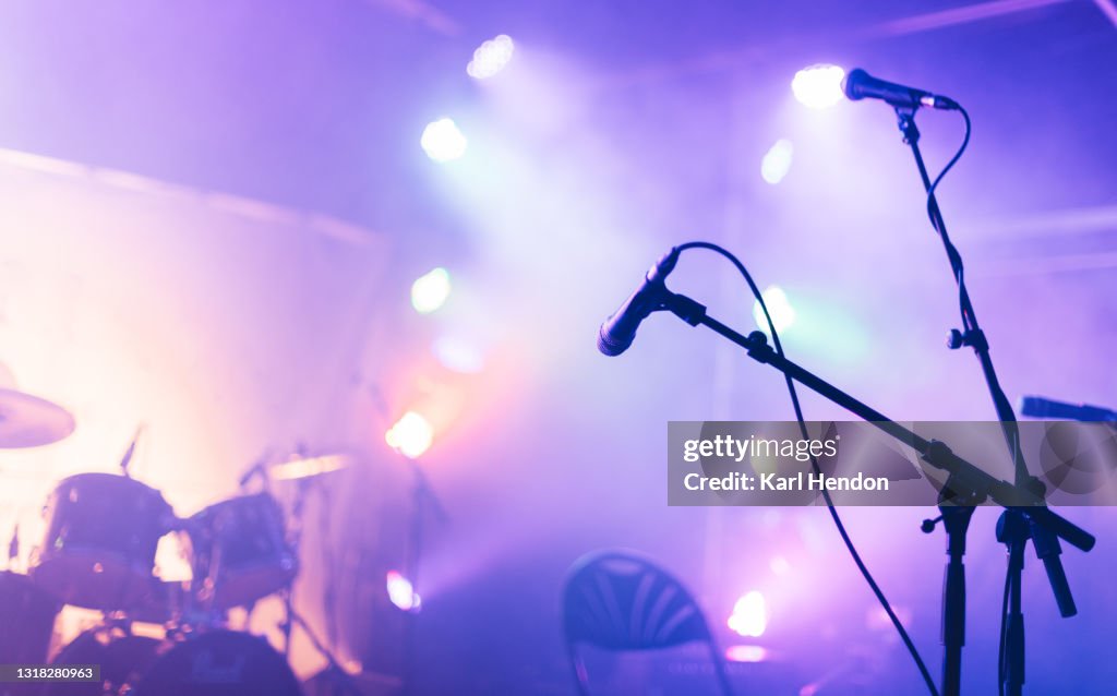 An illuminated concert stage - stock photo