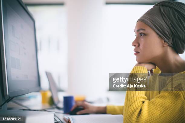 young programmer testing the software. - concentration stock pictures, royalty-free photos & images