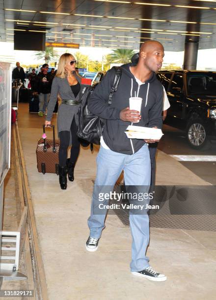 Evelyn Lozada and fiance Chad Ochocinco sighting at Miami International Airport on January 5, 2011 in Miami, Florida.