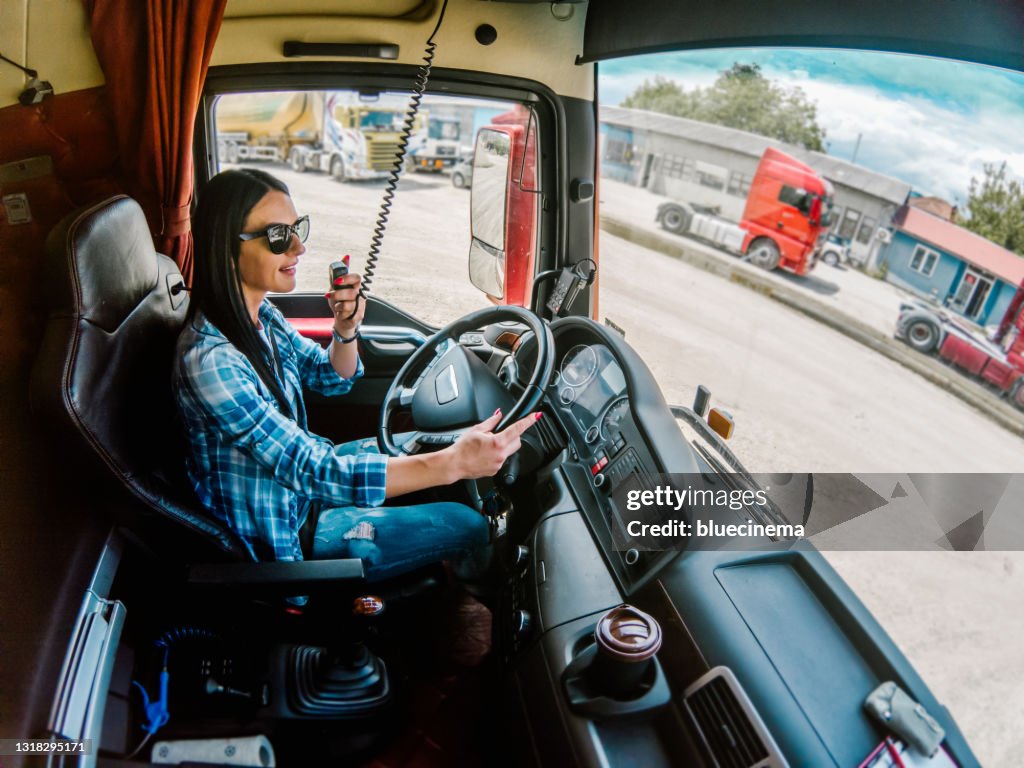 Professional femele truck driver CB talking