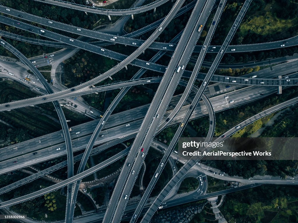 Aerial View of Complex Overpass and Busy Traffic