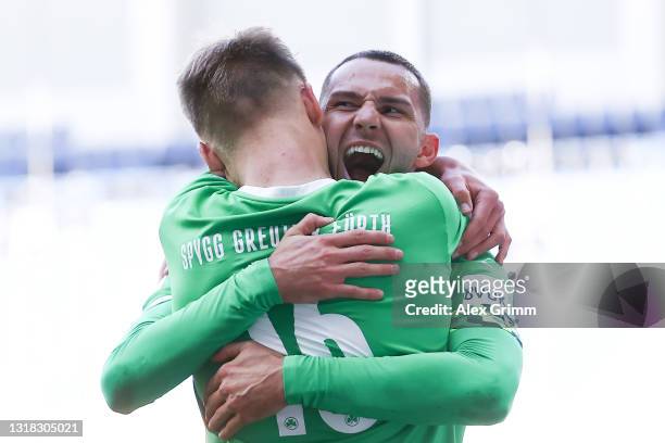 Branimir Hrgota of Greuther Fürth celebrates his team's second goal with teammate Havard Nielsen during the Second Bundesliga match between SC...