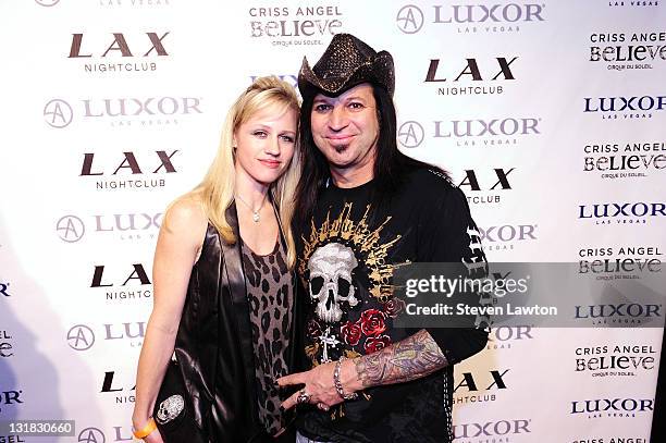 Artist Michael Gader and guest arrive for Criss Angel's birthday and 1000th 'Criss Angel BeLIEve' show at LAX Nightclub on December 11, 2010 in Las...