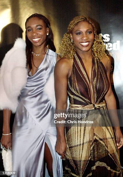 Tennis players Venus Williams, left, and Serena Williams attend the Sports Illustrated Sportsman of the Year 2000 awards ceremony December 12, 2000...