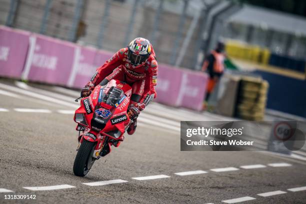 Jack Miller of Australia and Ducati Lenovo Team rolls in pitlane with a stoppie after his MotoGP race win at Bugatti Circuit on May 16, 2021 in Le...