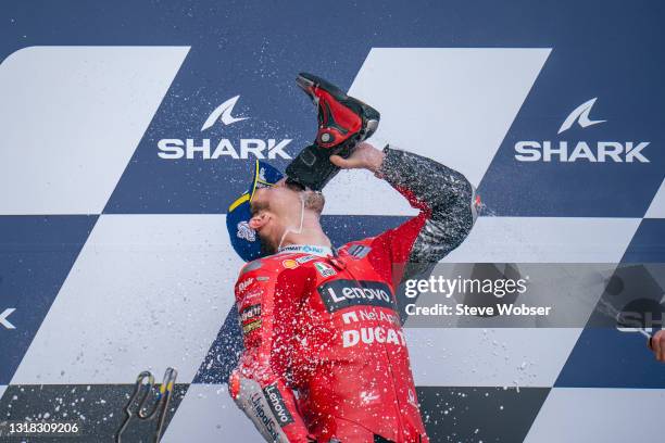 Jack Miller of Australia and Ducati Lenovo Team drinks Prosecco out of his boots after his race win at Bugatti Circuit on May 16, 2021 in Le Mans,...