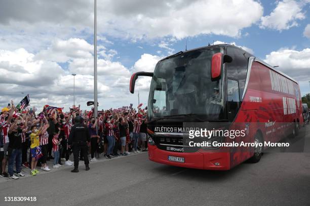 Atletico de Madrid fans welcome the team coach as the players arrive at the stadium prior to the La Liga Santander match between Atletico de Madrid...