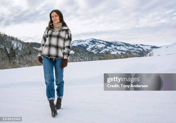 young woman standing outdoors in winter - jean anderson stock pictures, royalty-free photos & images