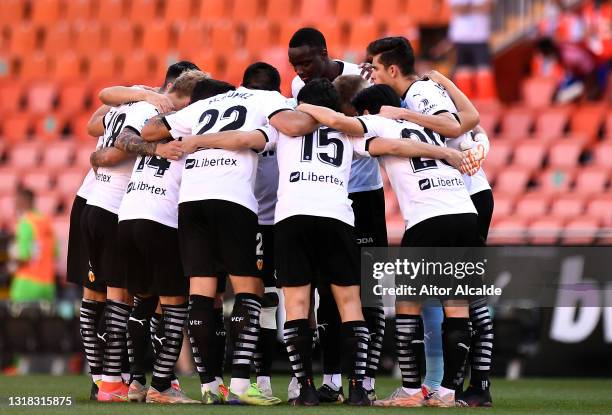 Valencia huddle prior to the La Liga Santander match between Valencia CF and SD Eibar at Estadio Mestalla on May 16, 2021 in Valencia, Spain....