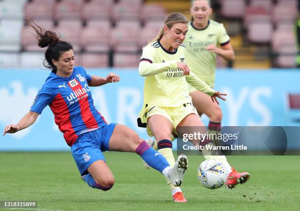 Jill Roord of Arsenal is tackled by Andria Georgiou of Crystal Palace during the Vitality Women's FA Cup fifth round match between Arsenal Women v...