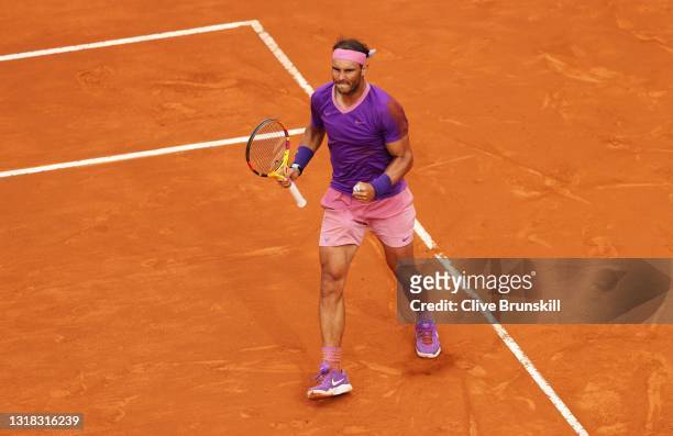 Rafael Nadal of Spain celebrates after winning a point over Novak Djokovic of Serbia during the men's final at Foro Italico on May 16, 2021 in Rome,...