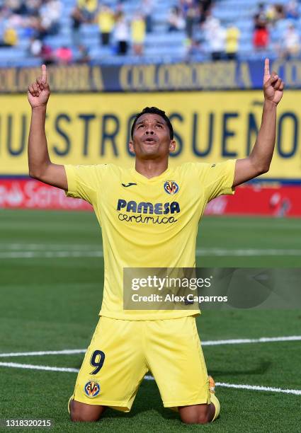Carlos Bacca of Villarreal CF celebrates after scoring their side's first goal during the La Liga Santander match between Villarreal CF and Sevilla...
