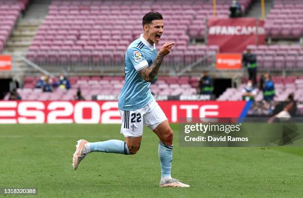 Santi Mina of Celta Vigo celebrates after scoring their team's first goal during the La Liga Santander match between FC Barcelona and RC Celta at...