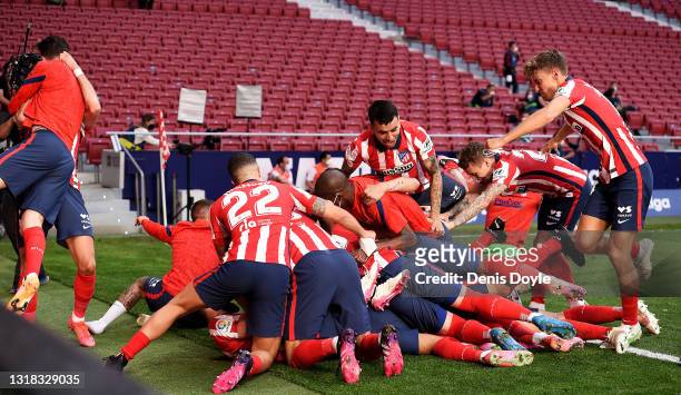 The Atletico de Madrid team celebrate after Luis Suarez scores their second goal during the La Liga Santander match between Atletico de Madrid and...