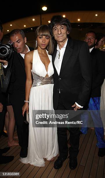 Ana Araujo and musician Ronnie Wood attend the private dinner on the Cavalli yacht during the 64th Annual Cannes Film Festival on May 18, 2011 in...