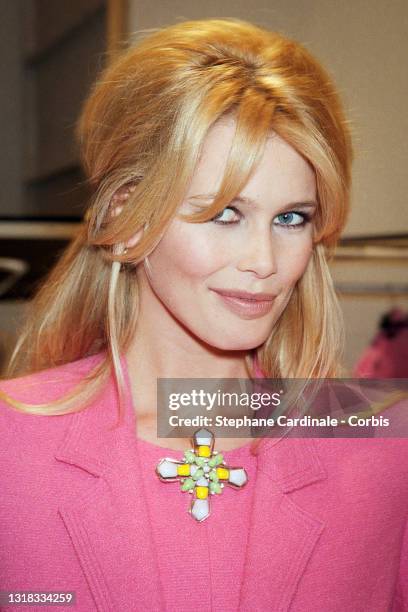 Top Model Claudia Schiffer poses backstage during the Chanel Ready to Wear Spring/Summer 1996 show as part of Paris Fashion Week on October 19, 1995...