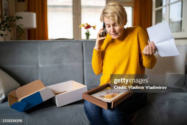 angry custmer looking at broken online store order - shopping disappointment stock pictures, royalty-free photos & images