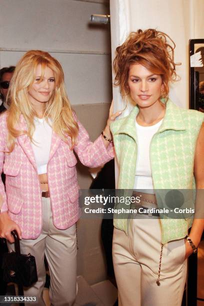 Top Models Claudia Schiffer and Cindy Crawford pose backstage during the Chanel Ready to Wear Spring/Summer 1996 show as part of Paris Fashion Week...