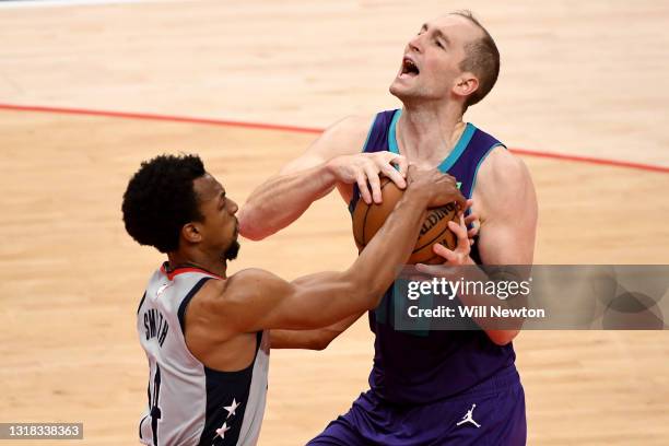 Ish Smith of the Washington Wizards steals the ball from Cody Zeller of the Charlotte Hornets during the second half at Capital One Arena on May 16,...