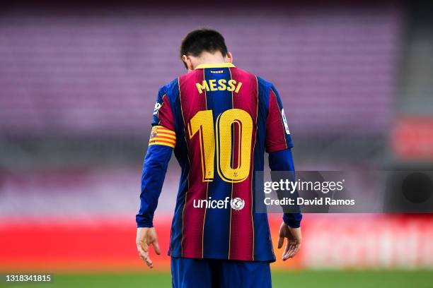 Lionel Messi of FC Barcelona shows his dejection during the La Liga Santander match between FC Barcelona and RC Celta at Camp Nou on May 16, 2021 in...