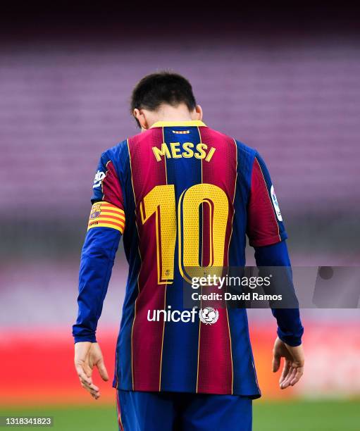 Lionel Messi of FC Barcelona shows his dejection during the La Liga Santander match between FC Barcelona and RC Celta at Camp Nou on May 16, 2021 in...