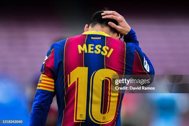 Lionel Messi of FC Barcelona shows his dejection during the La Liga Santander match between FC Barcelona and RC Celta at Camp Nou on May 16, 2021 in...