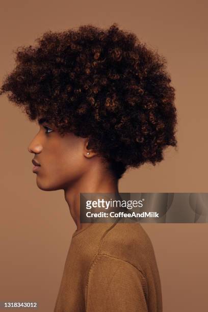 Man Curly Brown Hair Photos and Premium High Res Pictures - Getty Images