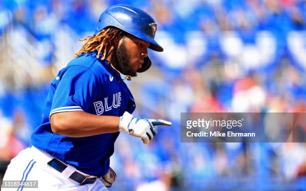 Vladimir Guerrero Jr. #27 of the Toronto Blue Jays rounds the bases after a solo home run in the eighth inning during a game against the Philadelphia...