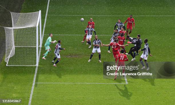 Alisson Becker of Liverpool scores the winning goal during the Premier League match between West Bromwich Albion and Liverpool at The Hawthorns on...