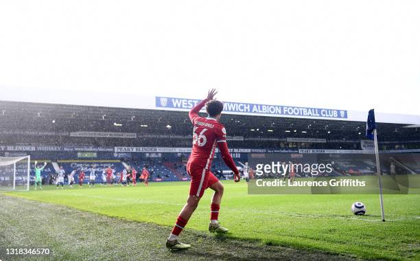 Trent Alexander-Arnold of Liverpool prepares to take a corner to set up the winning goal during the Premier League match between West Bromwich Albion...
