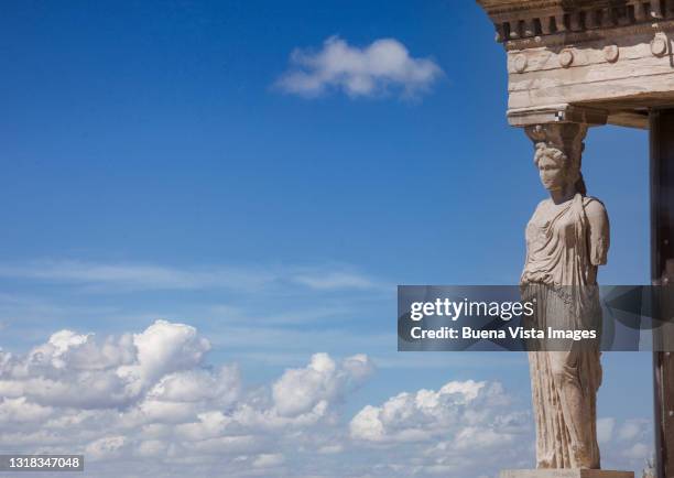 greece. athens. a caryatid of the erechtheion temple. - poseidon statue stockfoto's en -beelden