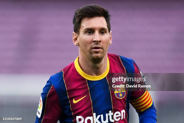 Lionel Messi of FC Barcelona looks on during the La Liga Santander match between FC Barcelona and RC Celta at Camp Nou on May 16, 2021 in Barcelona,...