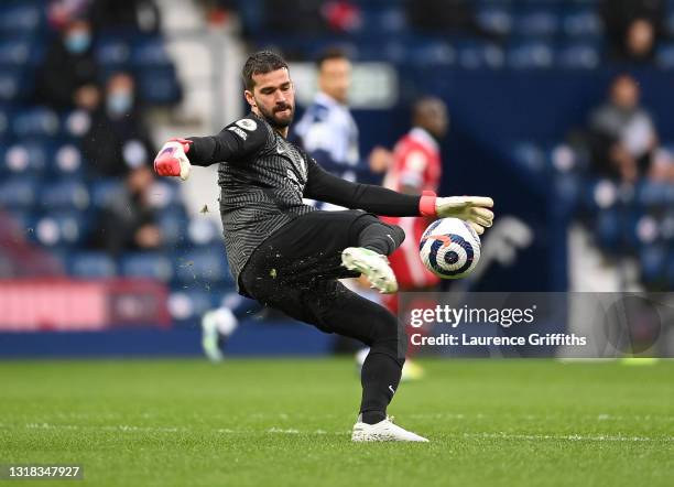 Alisson Becker of Liverpool clears the ball during the Premier League match between West Bromwich Albion and Liverpool at The Hawthorns on May 16,...