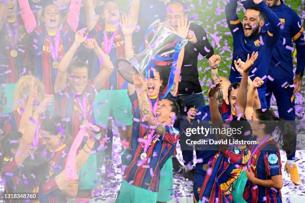 Jennifer Hermoso of FC Barcelona lifts the UEFA Women's Champions League Trophy in celebration with team mates following the UEFA Women's Champions...