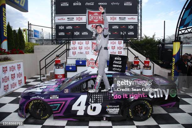 Alex Bowman, driver of the Ally Chevrolet, celebrates his win during the NASCAR Cup Series Drydene 400 at Dover International Speedway on May 16,...